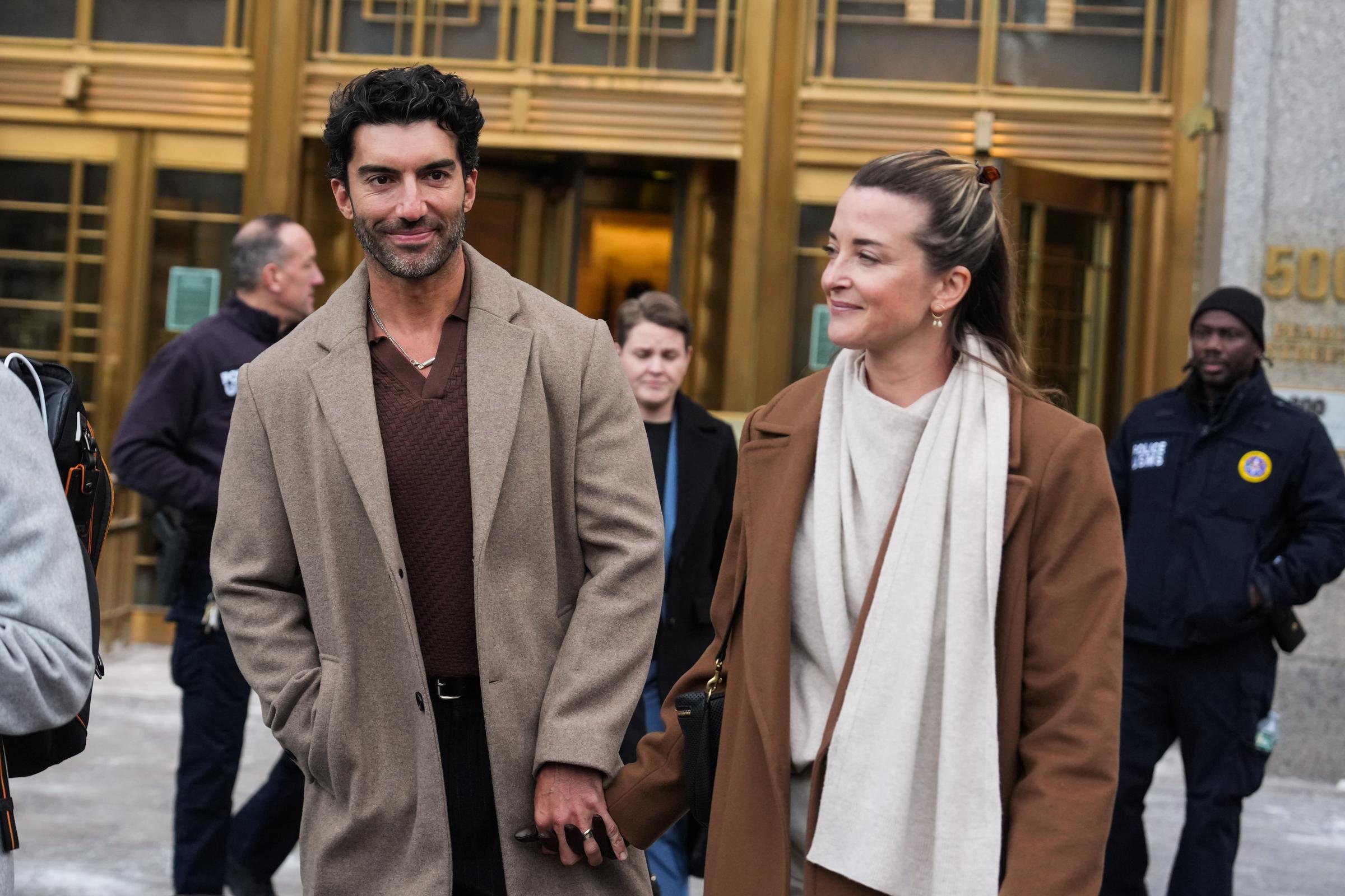 Justin Baldoni and Emily Baldoni arrive at court for continued settlement talks on February 12, 2026 in New York City. | Source: Getty Images