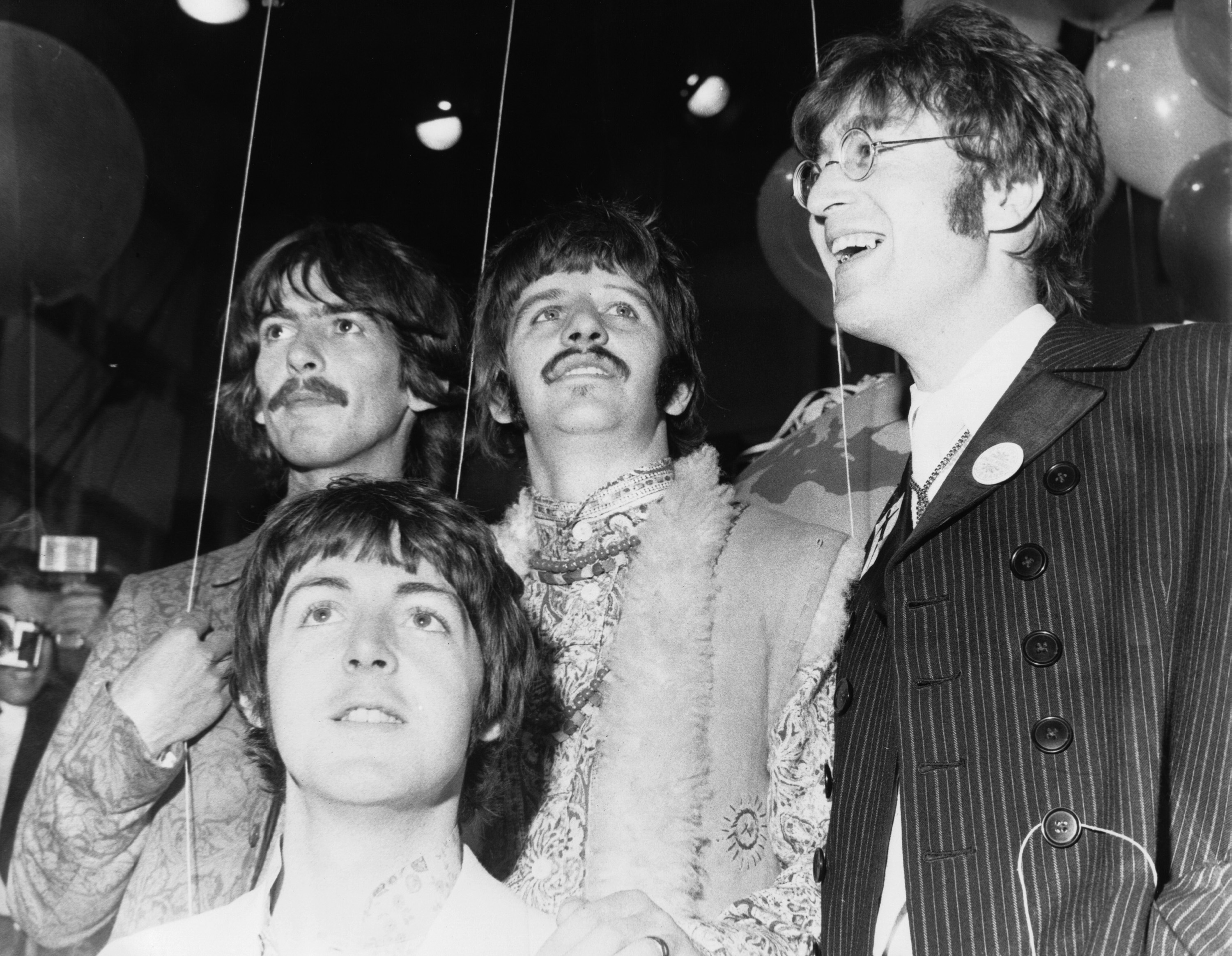 George Harrison, Paul McCartney, Ringo Starr and John Lennon appear on the "All You Need Is Love" TV Show from Abbey Road in June 1967. | Source: Getty Images
