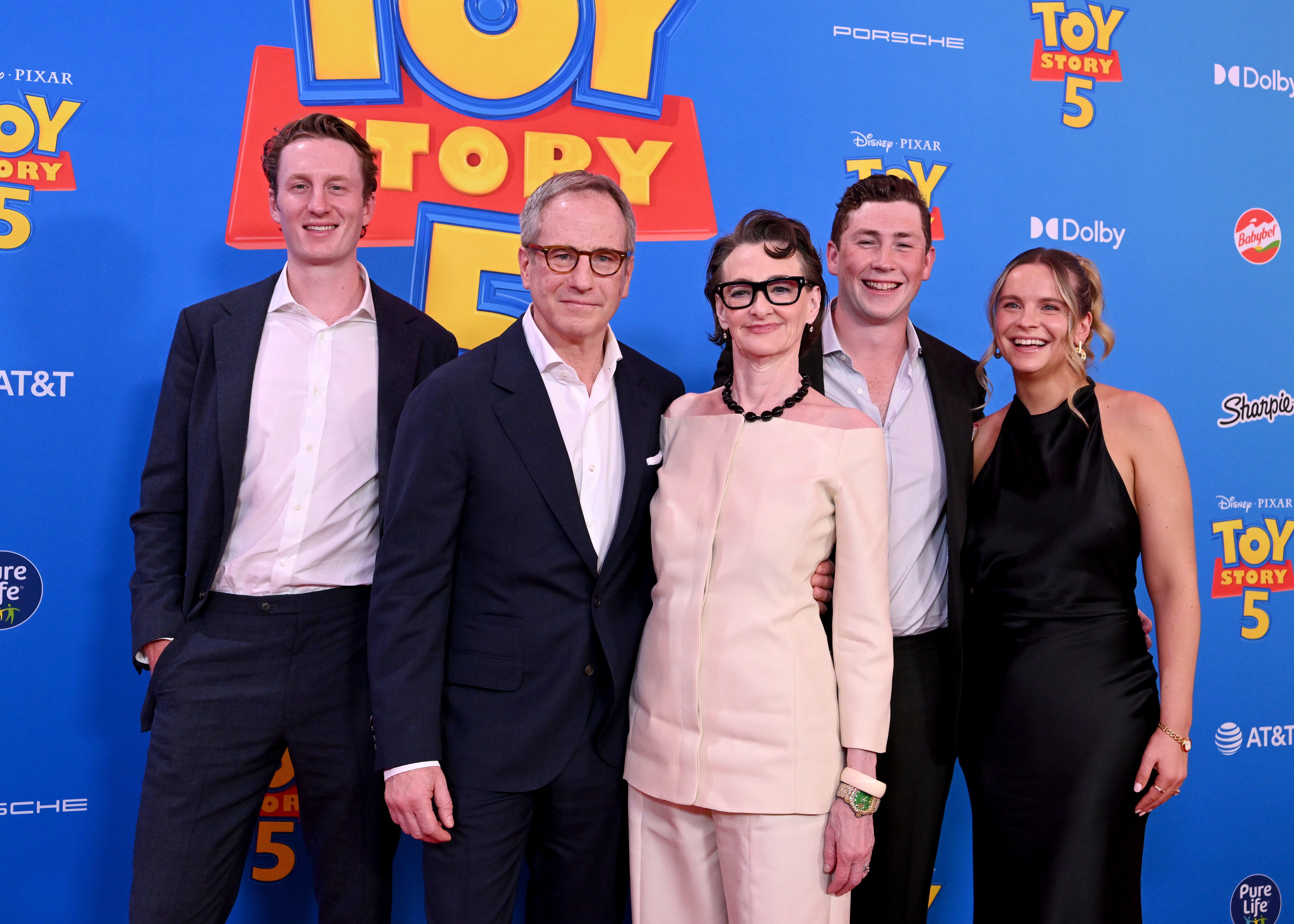 Joan Cusack attends Disney and Pixar's "Toy Story 5" premiere with sons Miles and Dylan, a lady guest, and her husband, Richard Burke, at the Dolby Theatre on June 9, 2026 in Los Angeles, California. | Source: Getty Images