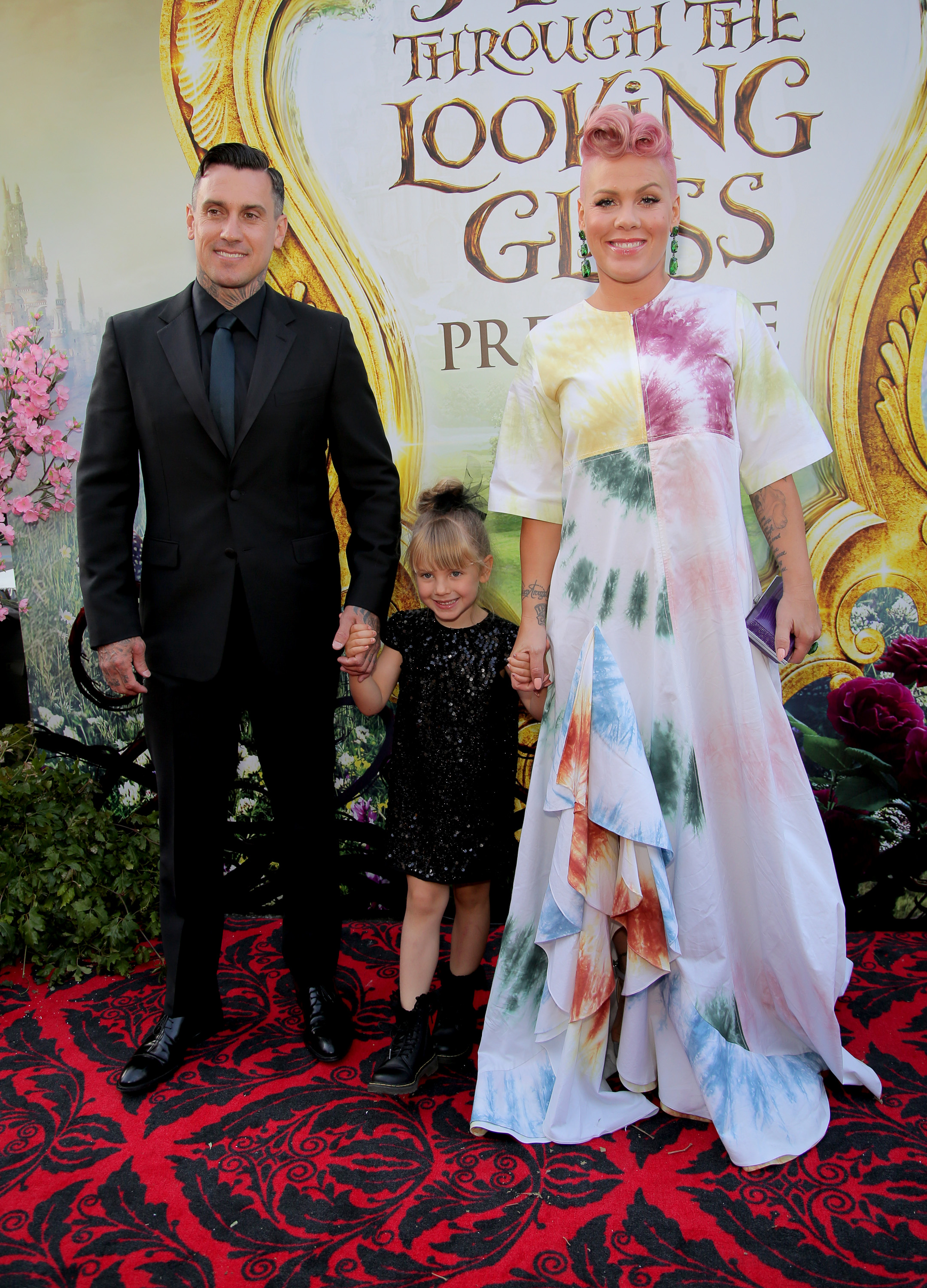 Willow joined her parents, P!nk and Carey Hart, on the red carpet at the Los Angeles premiere of "Alice Through the Looking Glass." Holding both of her parents' hands, the young girl smiled for cameras in a black sequined dress as the family made a rare public appearance together.
