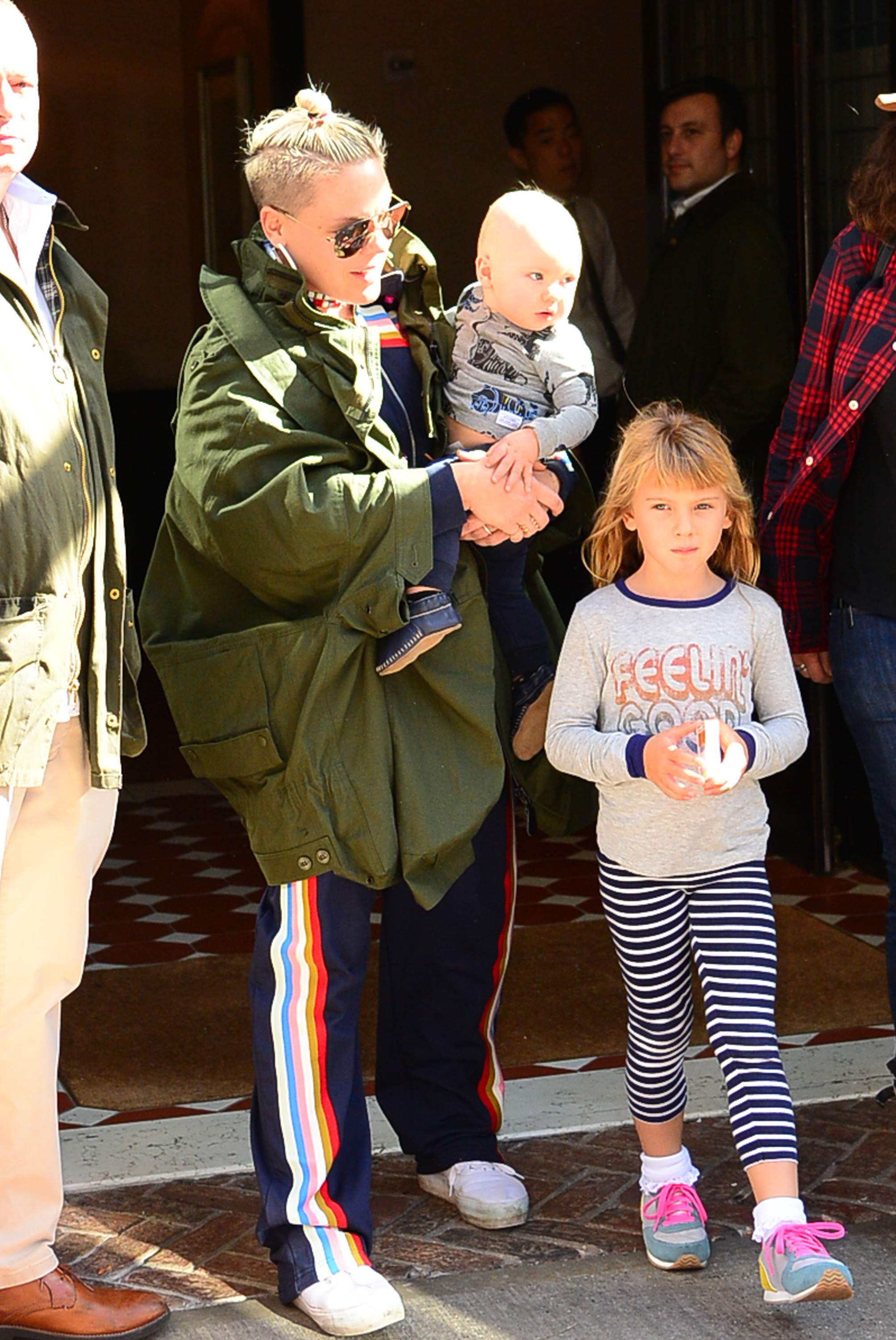 P!nk was photographed in New York City's SoHo neighborhood with both of her children. The singer carried baby Jameson while Willow walked beside them, capturing a candid family moment as the siblings appeared together in public during their early years.