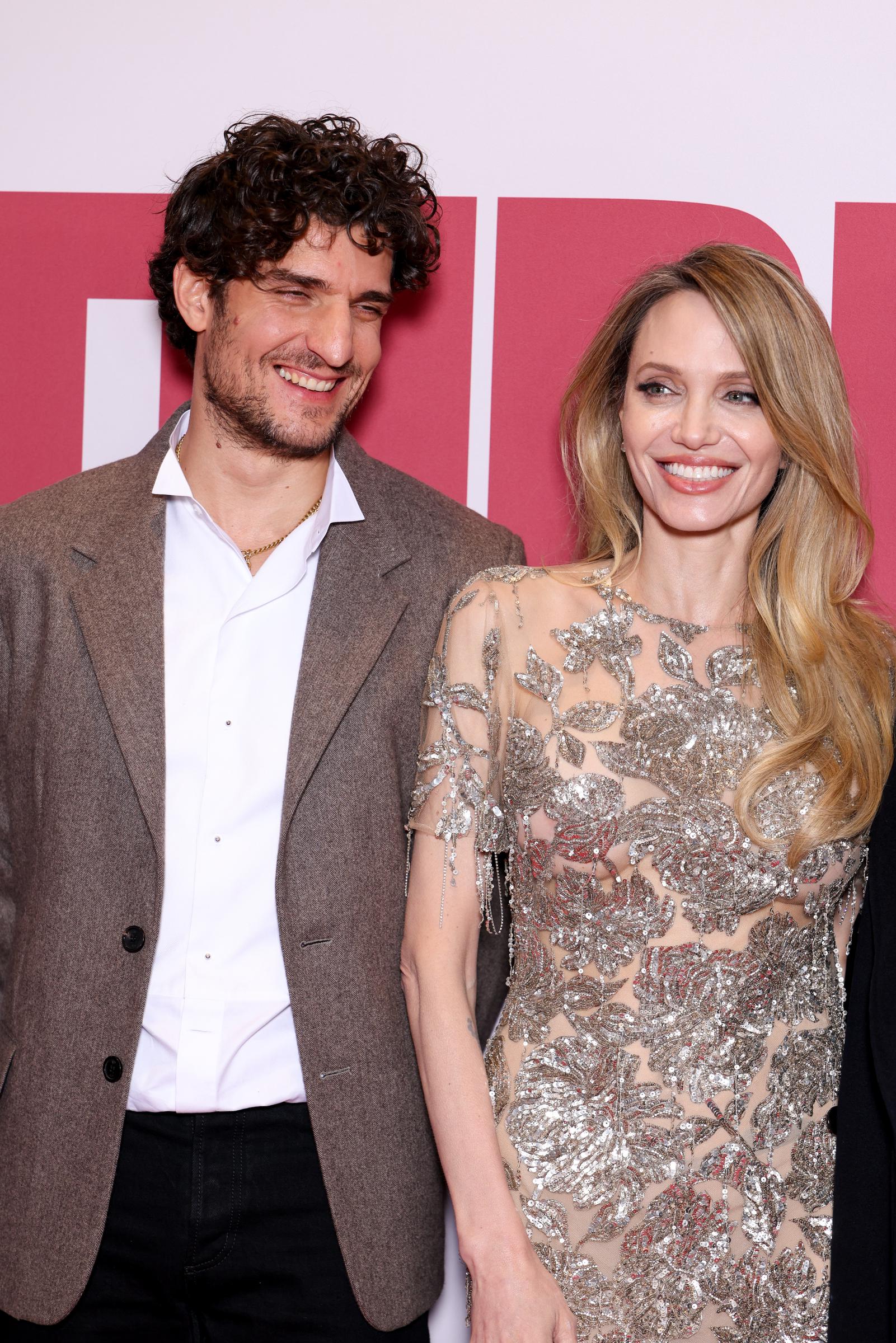 Louis Garrel and Angelina Jolie attend the "Couture" Première at Pathe Palace on February 9, 2026 in Paris, France. | Source: Getty Images