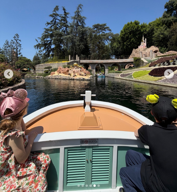 Their kids are being raised in a more normal setting outside of royalty. In this case, Archie and Lilibet are seen at Disneyland on May 11, 2026 | Source: Instagram/meghan