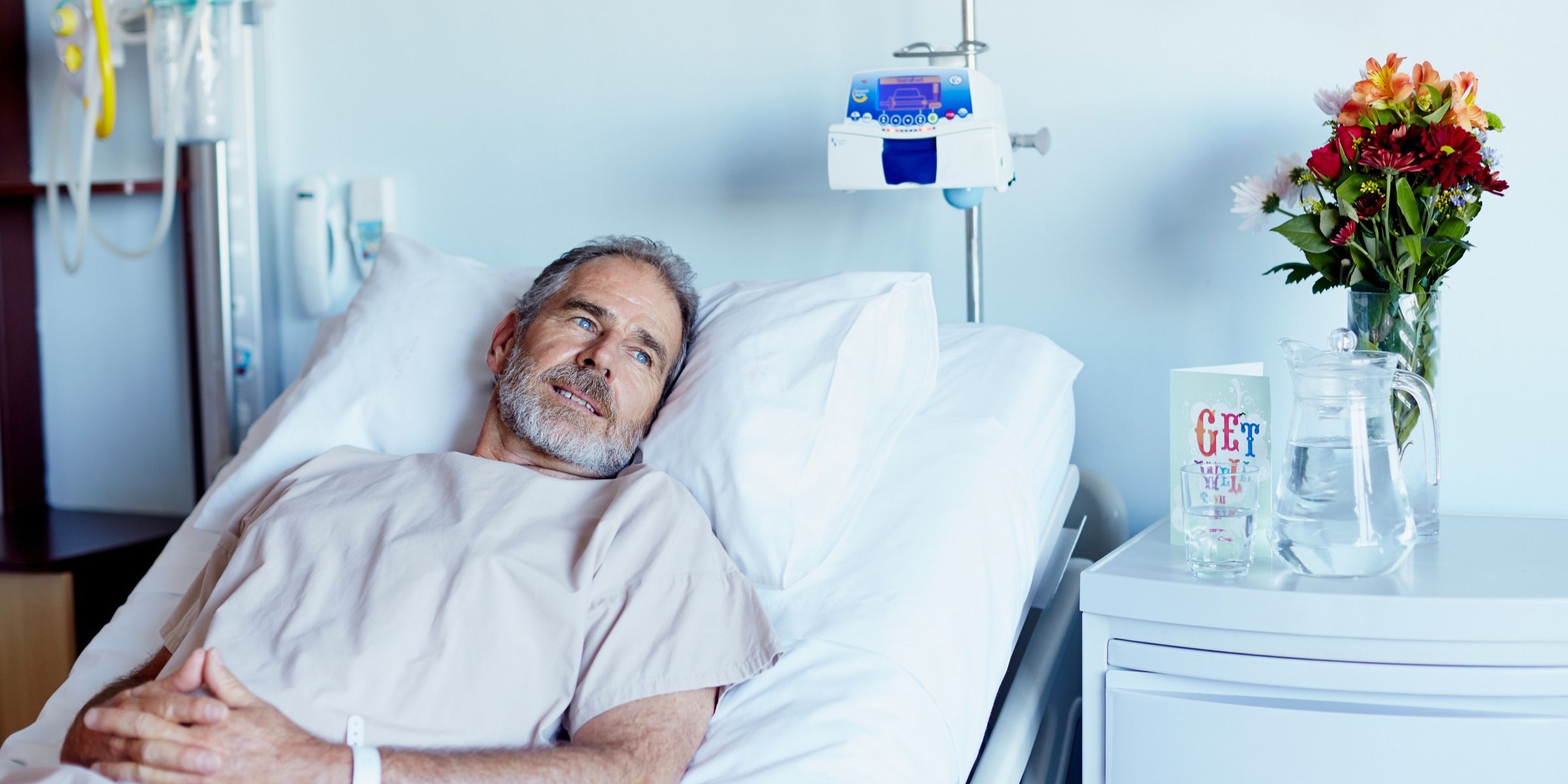An elderly man on a hospital bed | Source: Getty Images