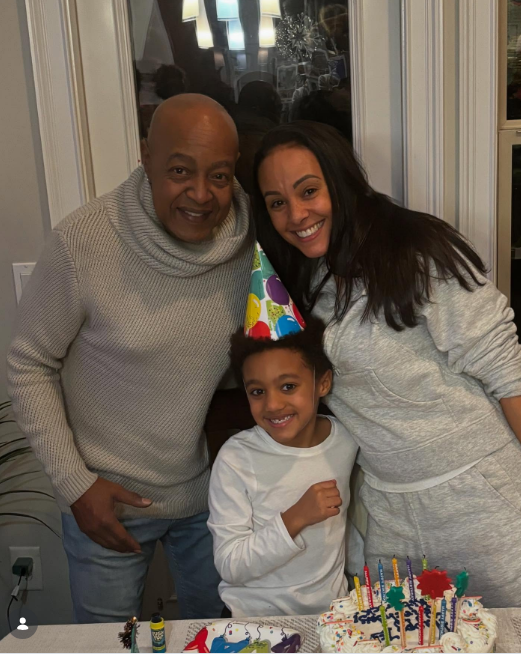 The happy family celebrated milestones and holidays like everyone else. On this occasion, they posed with a birthday cake for a picture shared to social media on January 1, 2025 | Source: Instagram/tanyabryson411