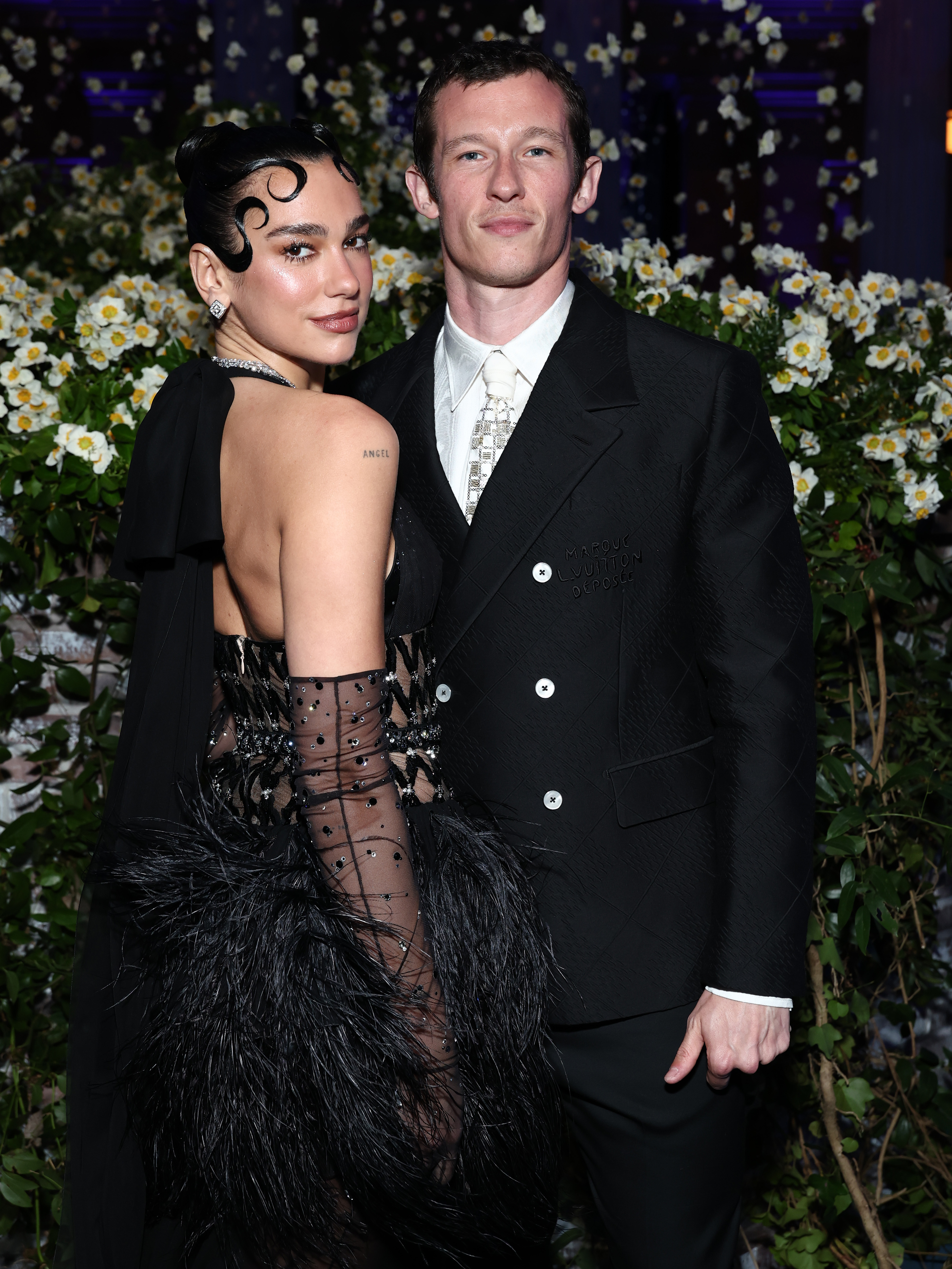 Dua Lipa and Callum Turner attend the 2025 Met Gala Celebrating "Superfine: Tailoring Black Style" at Metropolitan Museum of Art on May 5 in New York City. | Source: Getty Images