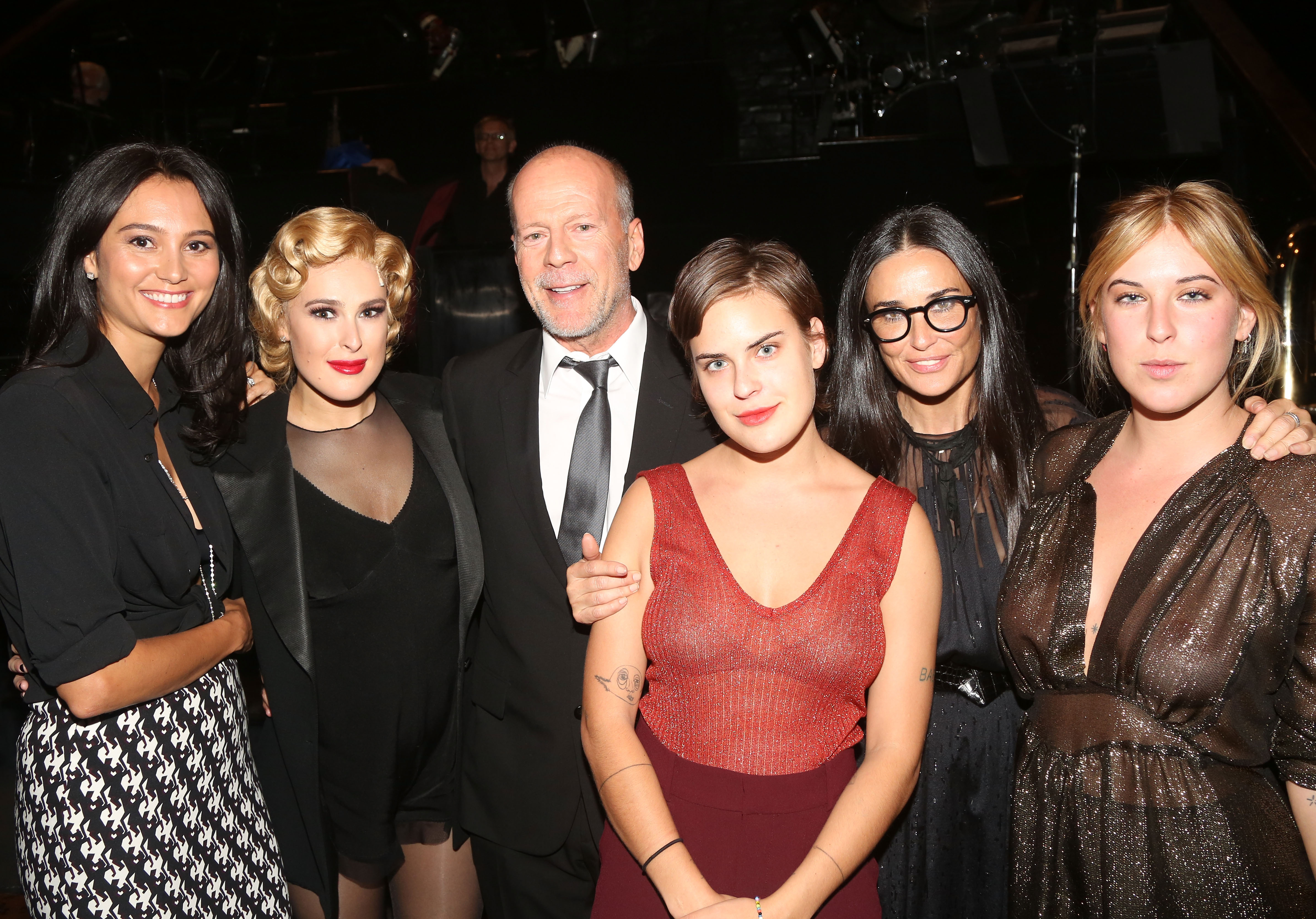 Emma Heming, Rumer Willis, father Bruce Willis, sister Tallulah Belle Willis, mother Demi Moore and sister Scout LaRue Willis pose backstage as Rumer makes her broadway debut as Roxie Hart in Broadway's "Chicago" on Broadway at The Ambassador Theater on September 21, 2015 in New York City. | Source: Getty Images