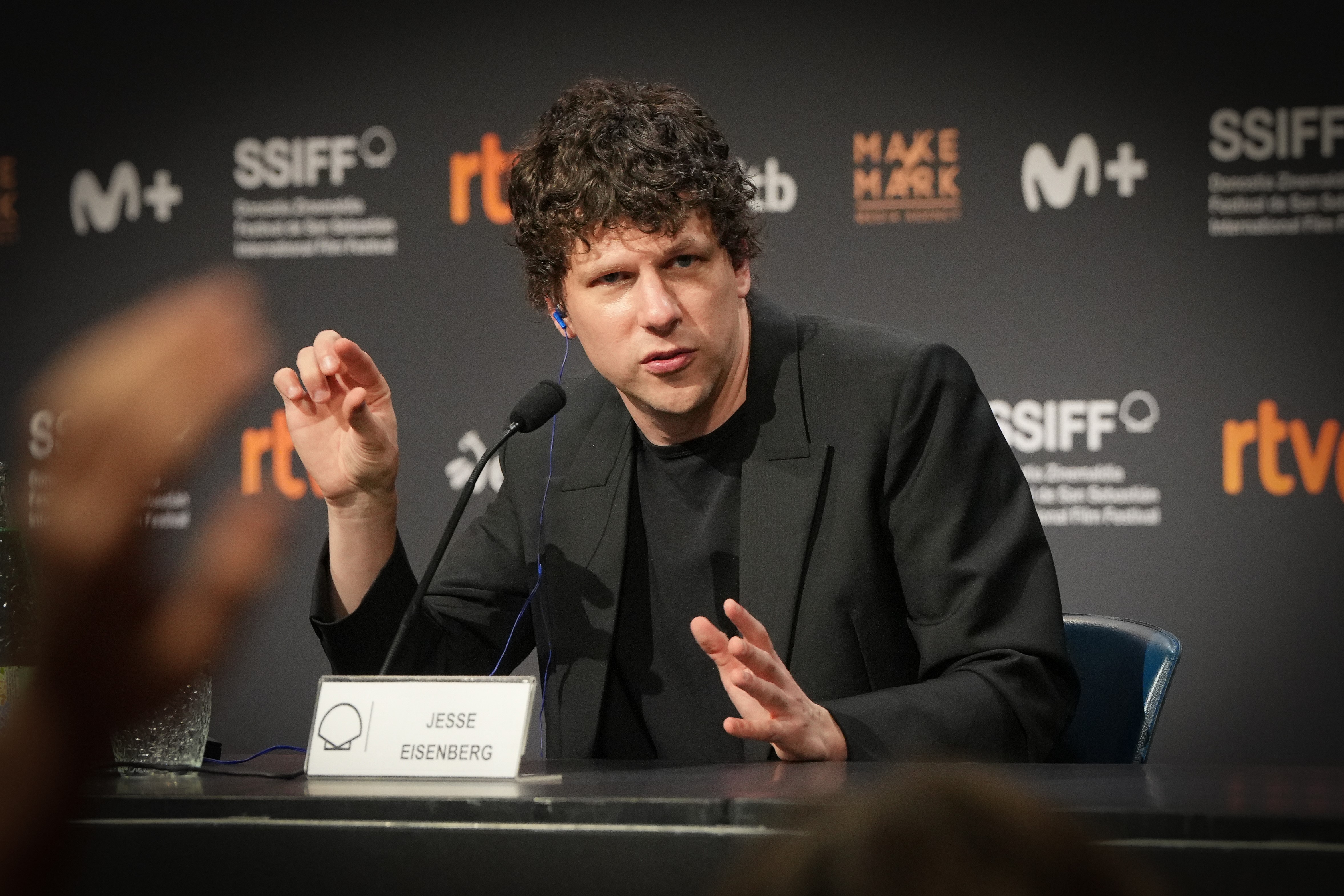 Jesse Eissenberg speaks to the media during the screening of the film "The Debut" at the San Sebastian Film Festival on 23 September 2026, in San Sebastian, the Basque Country, Spain. | Source: Getty Images