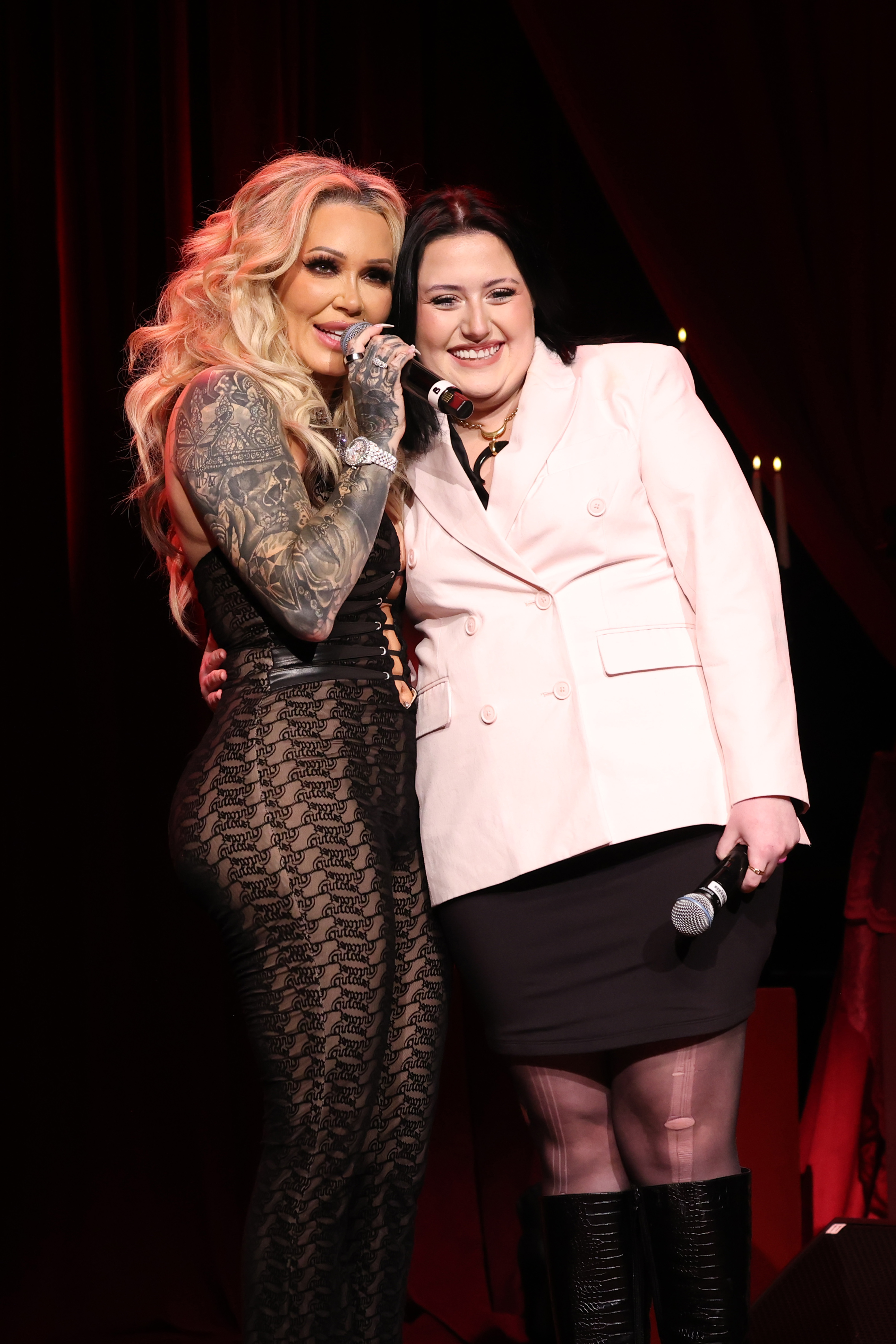 Bunnie XO and Bailee Ann DeFord speak onstage at the "Stripped Down: Unfiltered and Unapologetic" Tour at James K. Polk Theater on February 22, 2026 in Nashville, Tennessee. | SOurce: Getty Images
