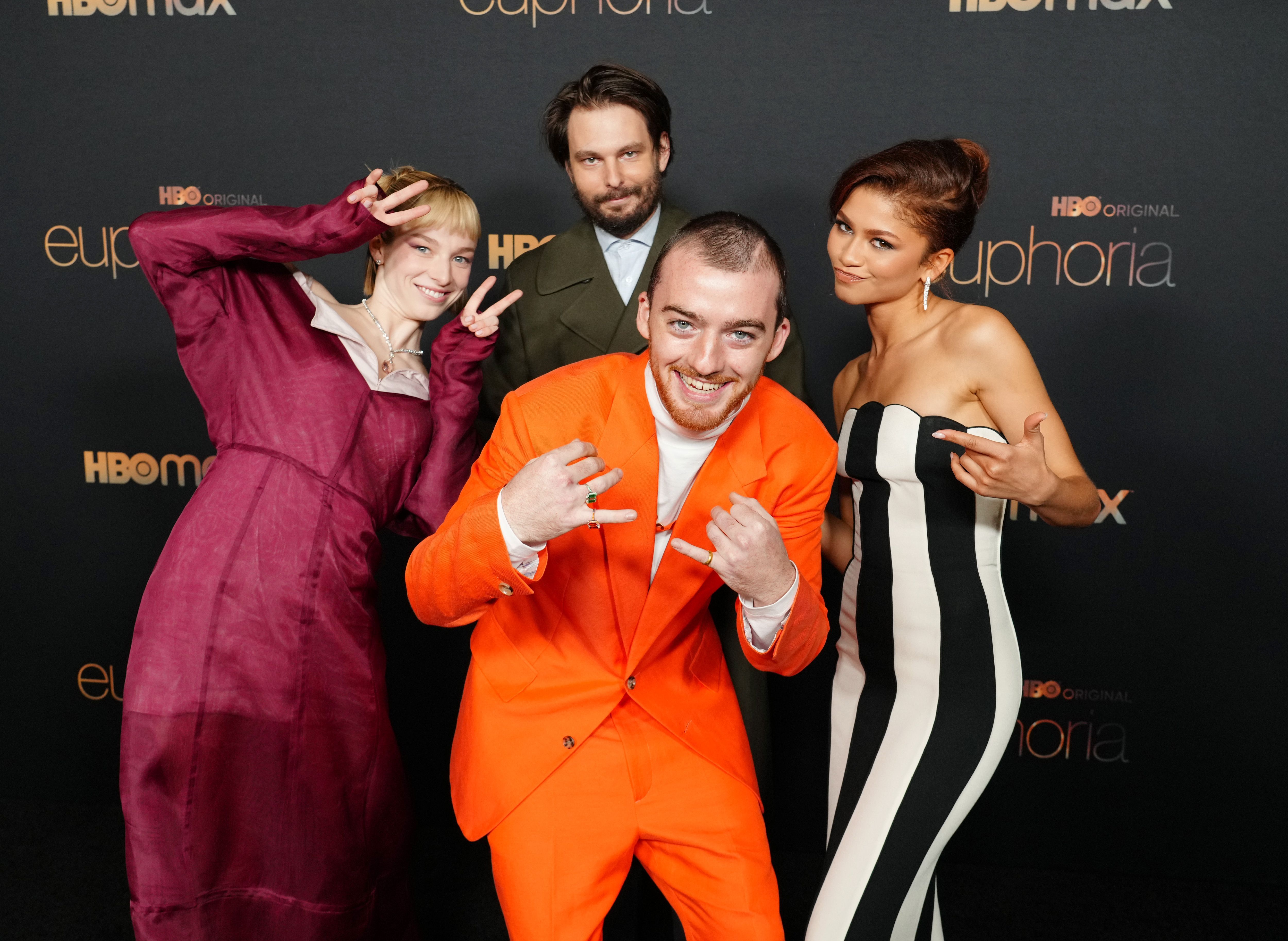 Hunter Schafer, Sam Levinson, Angus Cloud, and Zendaya attends HBO's "Euphoria" Season 2 Photo Call at Goya Studios on January 5, 2022 in Los Angeles, California. | Source: Getty Images