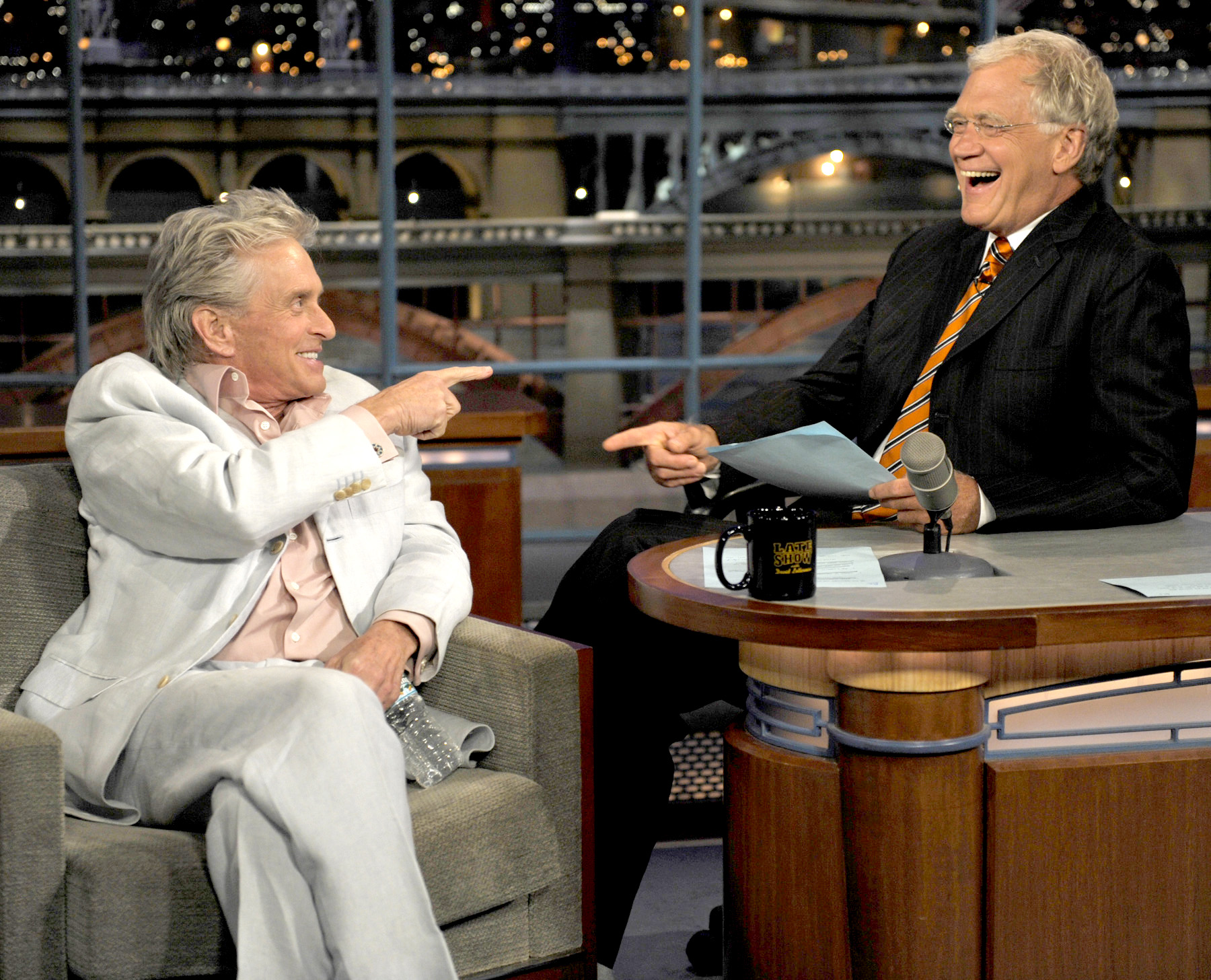 Michael Douglas gets his medical point across to host David Letterman during a guest appearance on the CBS Television Network's "Late Show with David Letterman" on August 31, 2010 in New York. | Source: Getty Images