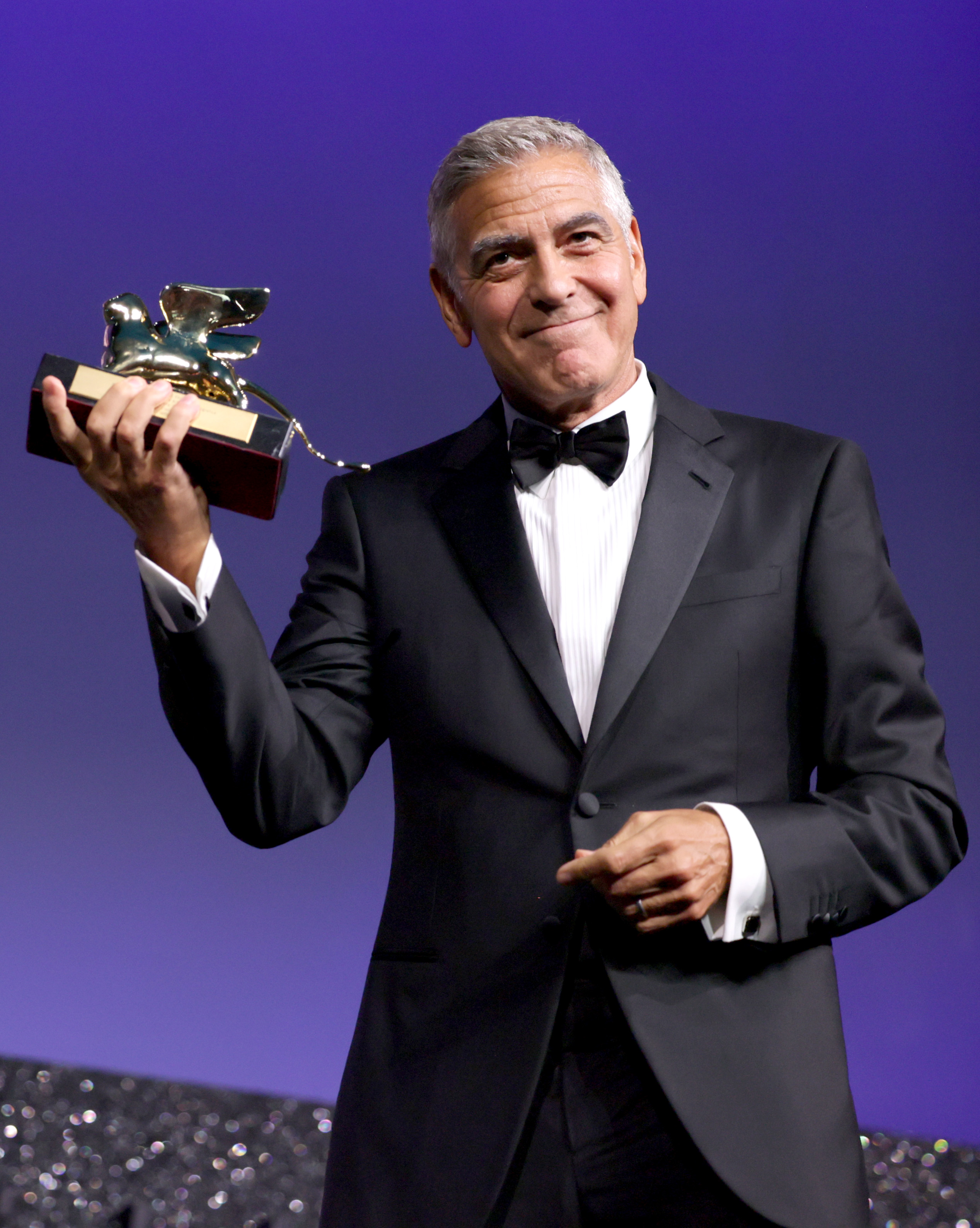 George Clooney receives the Golden Lion For Lifetime Achievement Award on stage at the Opening Ceremony during the 83rd Venice International Film Festival at Sala Grande on September 2 in Venice, Italy. | Source: Getty Images