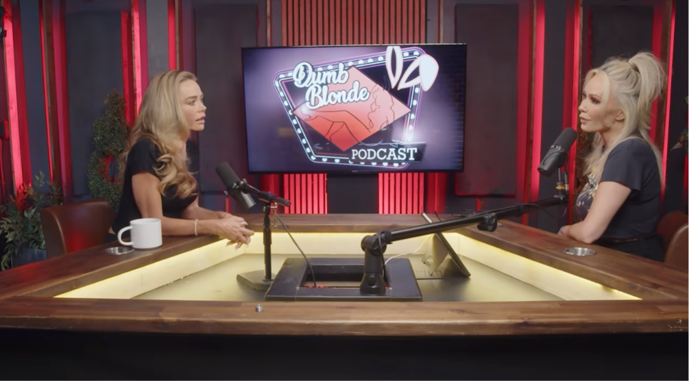Denise Richards and Bunnie Xo during an interview on "Dumbe Blonde," published on August 3, 2026. | Source: YouTube/Dumbe Blonde Podcast