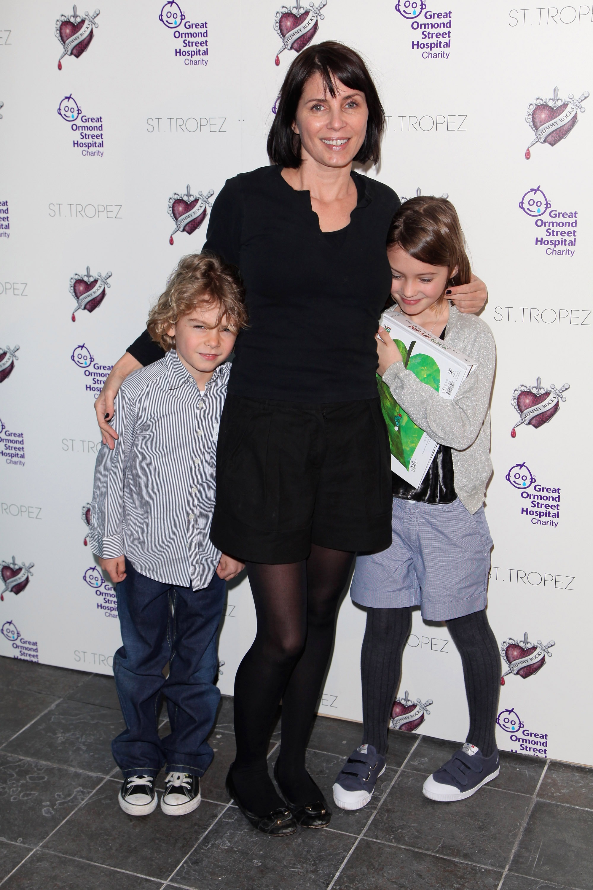 Sadie Frost, with Iris (R) and Rafferty (L), attends Mummy Rocks, a party for children, supported by St Tropez in aid of Great Ormond Street Hospital at The Tabernacle on March 21, 2009 in London, England. | Source: Getty Images