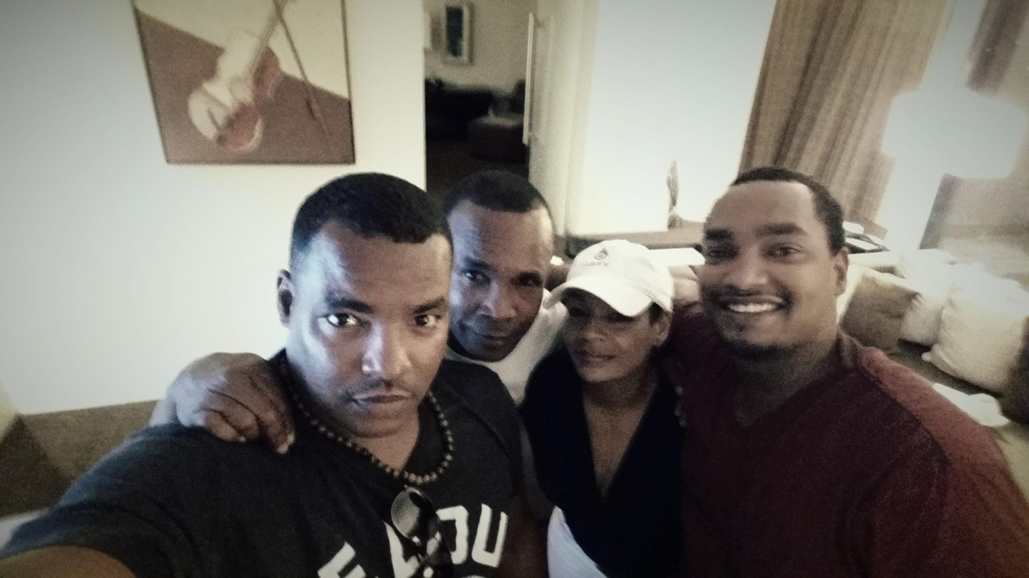 Juanita and Sugar Ray Leonard maintained a strong, supportive bond as they focused on raising their children despite no longer being together. On this occasion, they and their sons posed with both of their parents for a picture shared to social media on July 24, 2016 | Source: Facebook/Sugar Ray Leonard