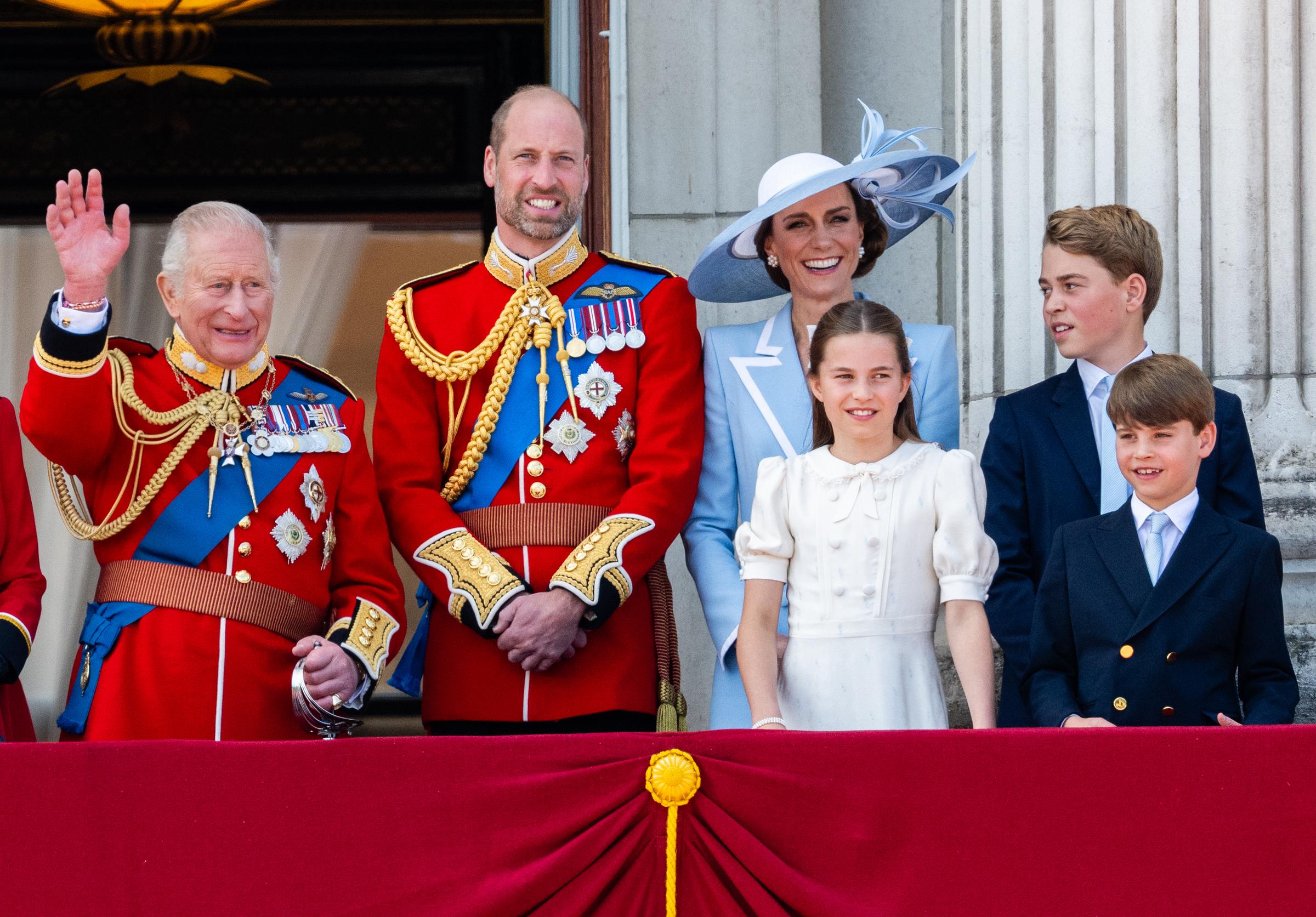 (L-R) King Charles III, Prince William, Prince of Wales, Princess Charlotte of Wales, Catherine, Princess of Wales, Prince George of Wales and Prince Louis of Wales watch an RAF flypast from the balcony of Buckingham Palace during Trooping The Colour on June 13, 2026 in London, England. | Source: Getty Images