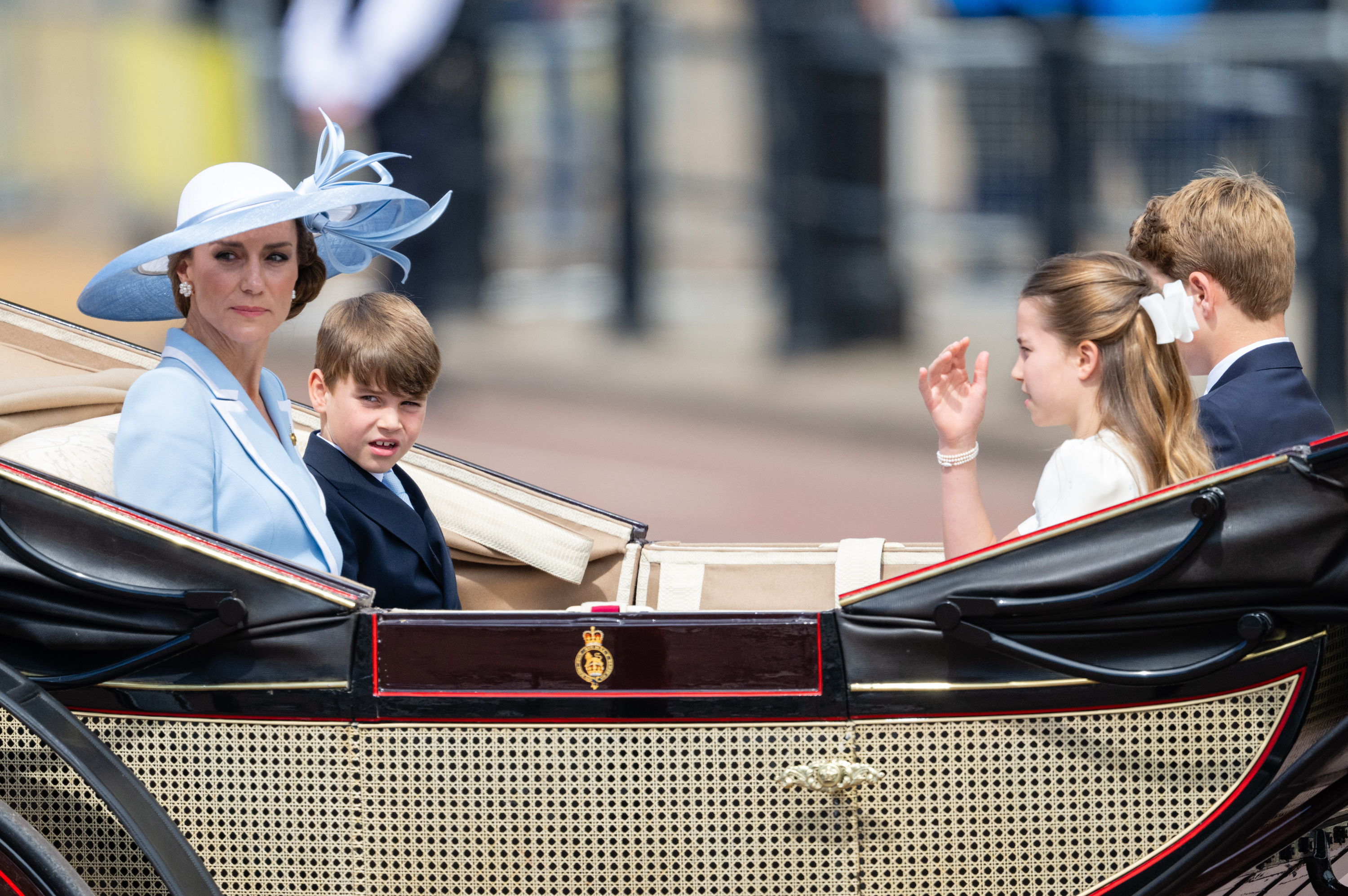 Catherine, Princess of Wales, Prince Louis of Wales, Princess Charlotte of Wales and Prince George of Wales travel by carriage during Trooping The Colour 2026 on June 13 in London, England. | Source: Getty Images