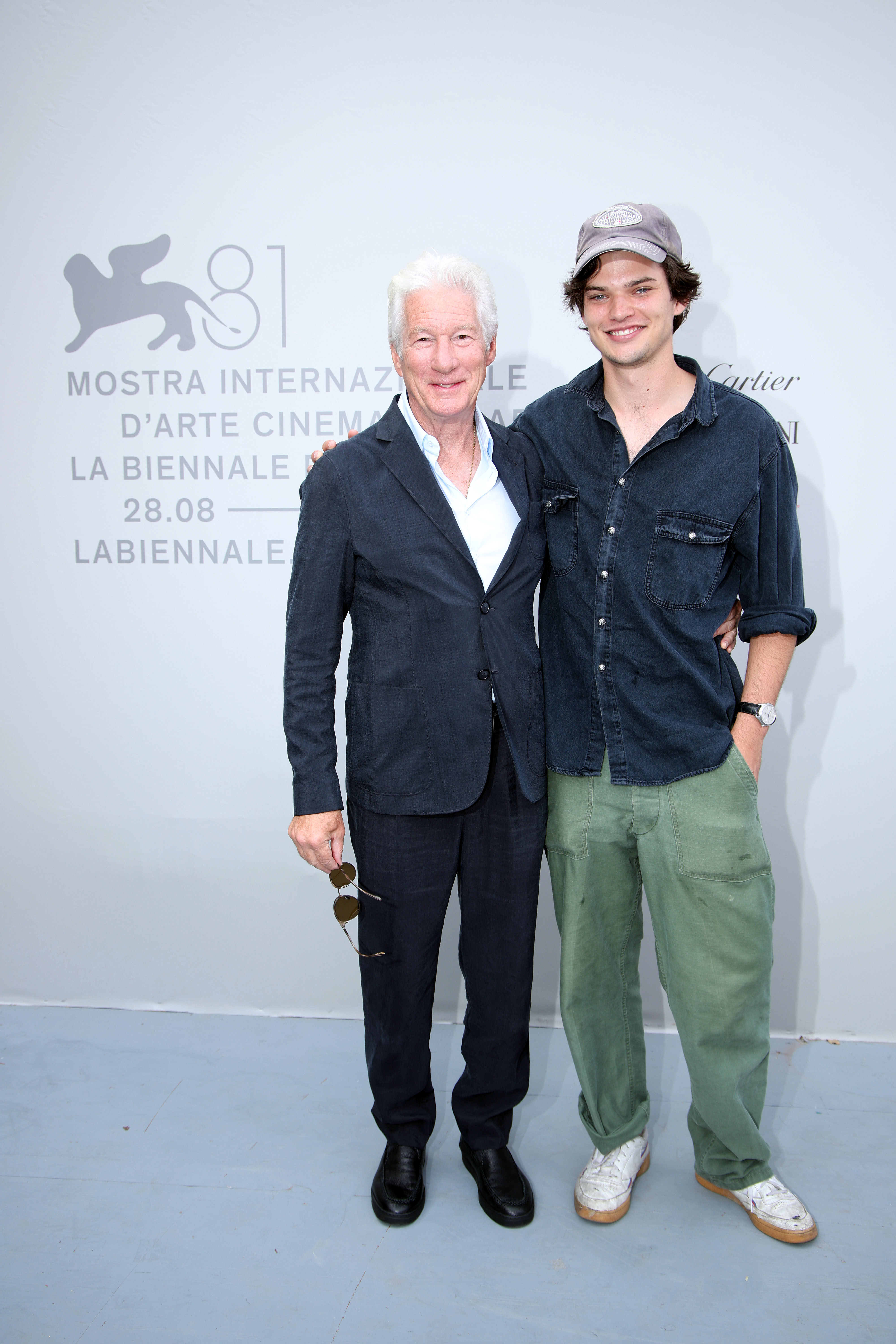 Richard Gere and Homer James Jigme Gere pose on stage at the "Cartier Masteclass: The Art and Craft of Cinama" during the 81st Venice International Film Festival on September 1, 2024 in Italy. | Source: Getty Images