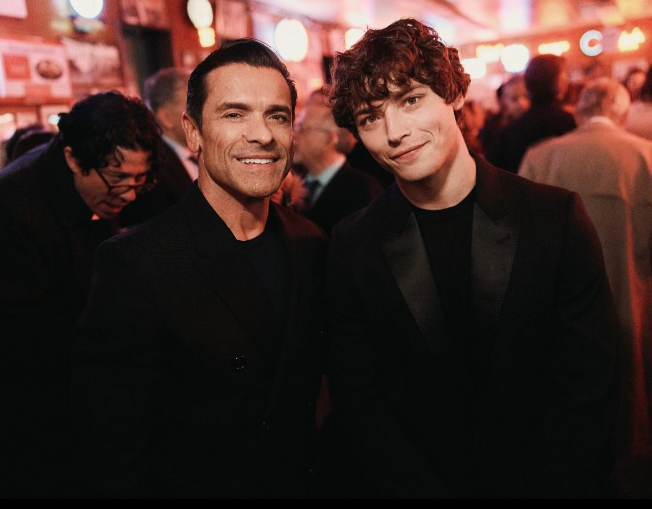 Joaquin Consuelos and Mark Consuelos pose together at an event. The image shows Joaquin years after his college wrestling career and graduation from the University of Michigan. | Source: Instagram/joaquinconsuelos