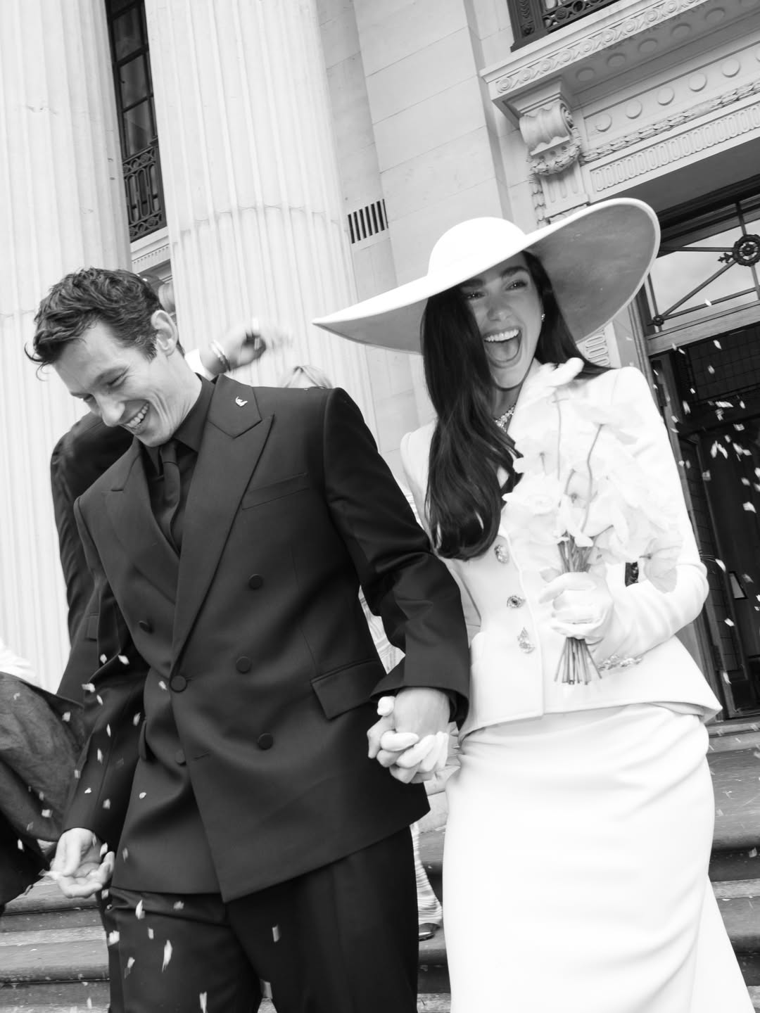 Dua Lipa and Callum Turner on their wedding day, as seen in a photo shared on June 2, 2026. | Source: Instagram/dualipa