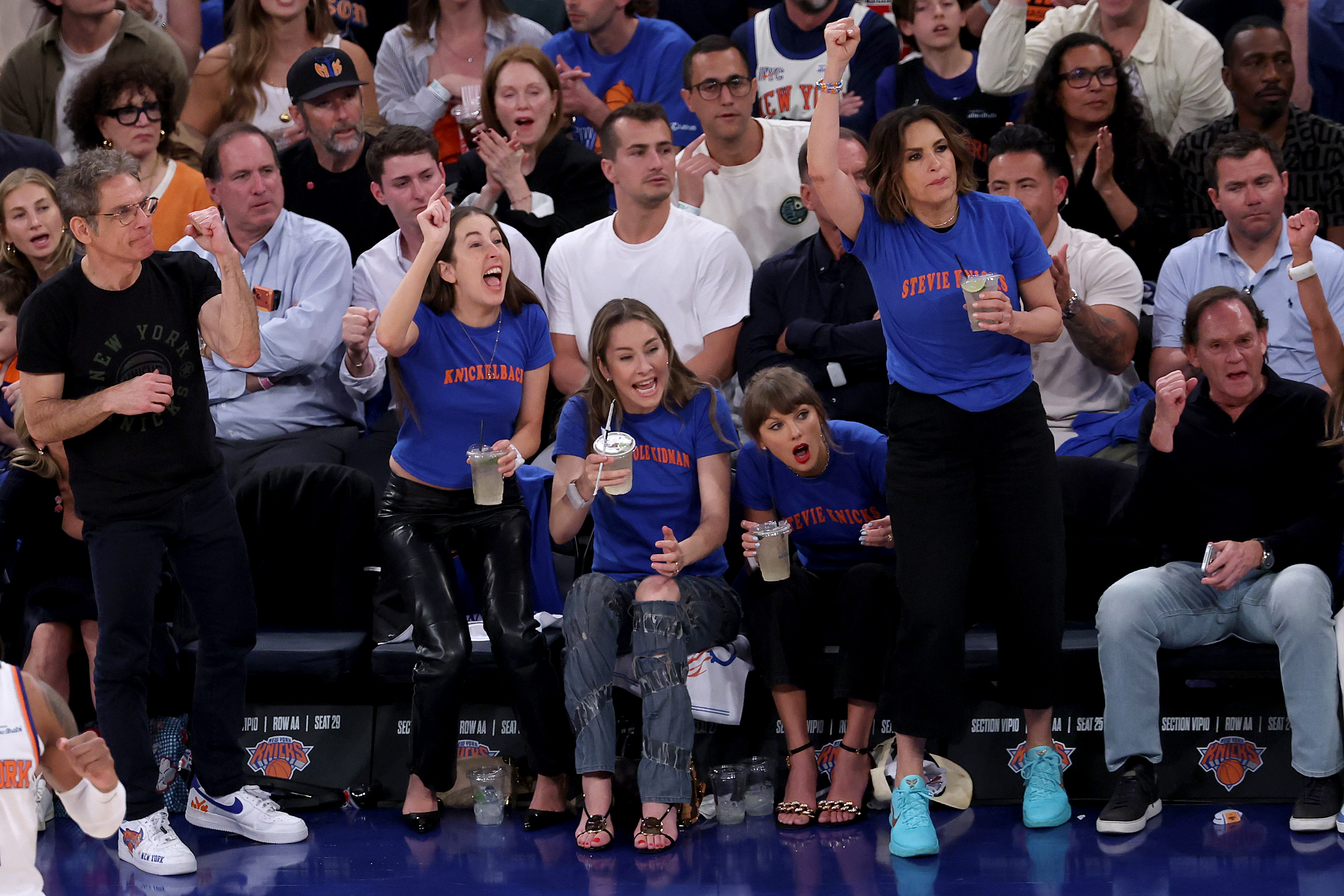 Taylor and her friends, Alana Haim, Este Haim, and Mariska Hargitay, wore matching t-shirts with puns related to the Knicks for Game Four of the NBA Finals at Madison Square Garden on June 10, 2026, in New York City, New York. | Source: Getty Images