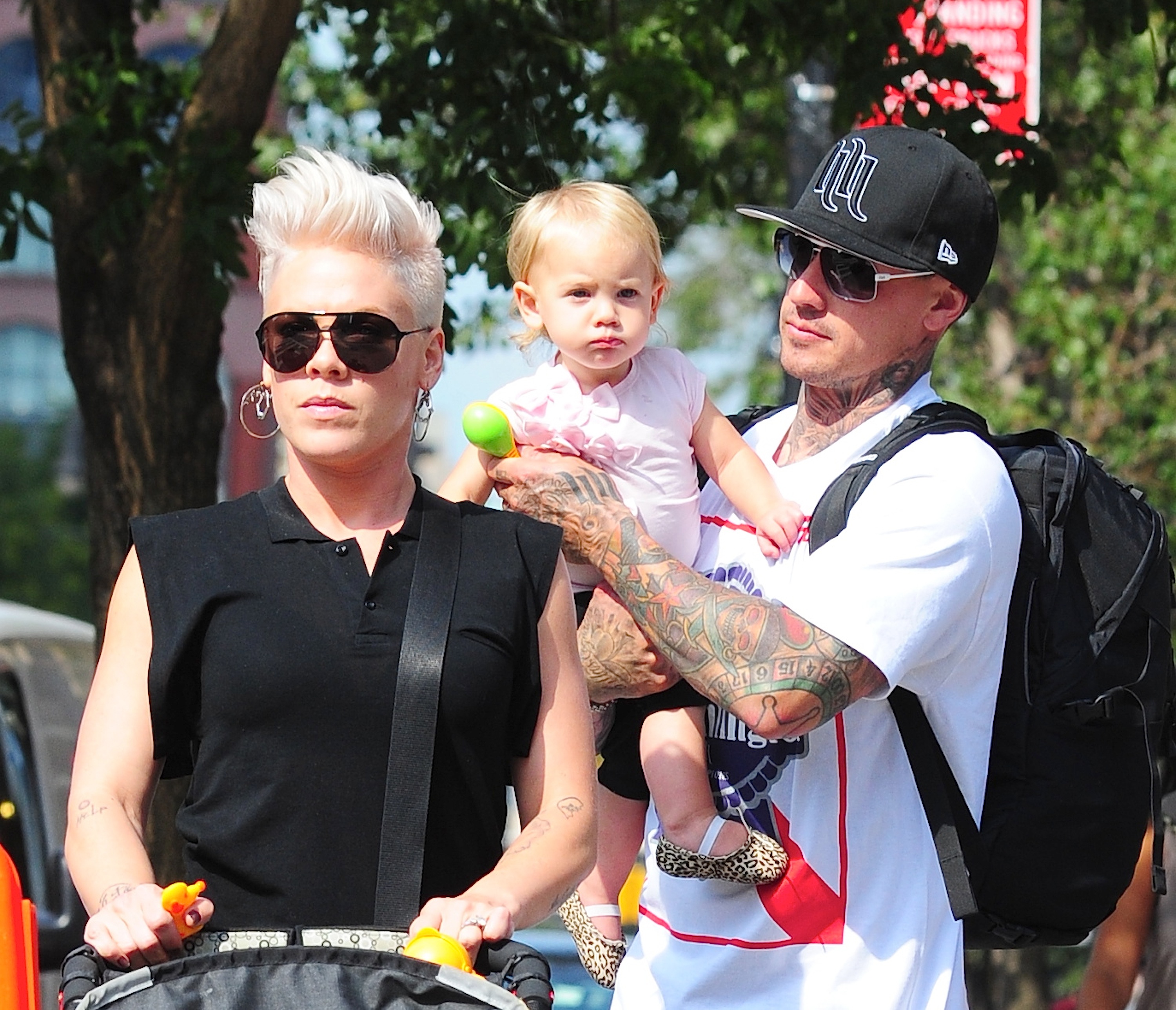 P!nk and Carey Hart were photographed in New York City's Tribeca neighborhood with their young daughter, Willow. Hart carried the toddler while the family enjoyed a daytime outing, offering one of the earliest public glimpses of Willow as fans began watching her grow up alongside her famous parents.
