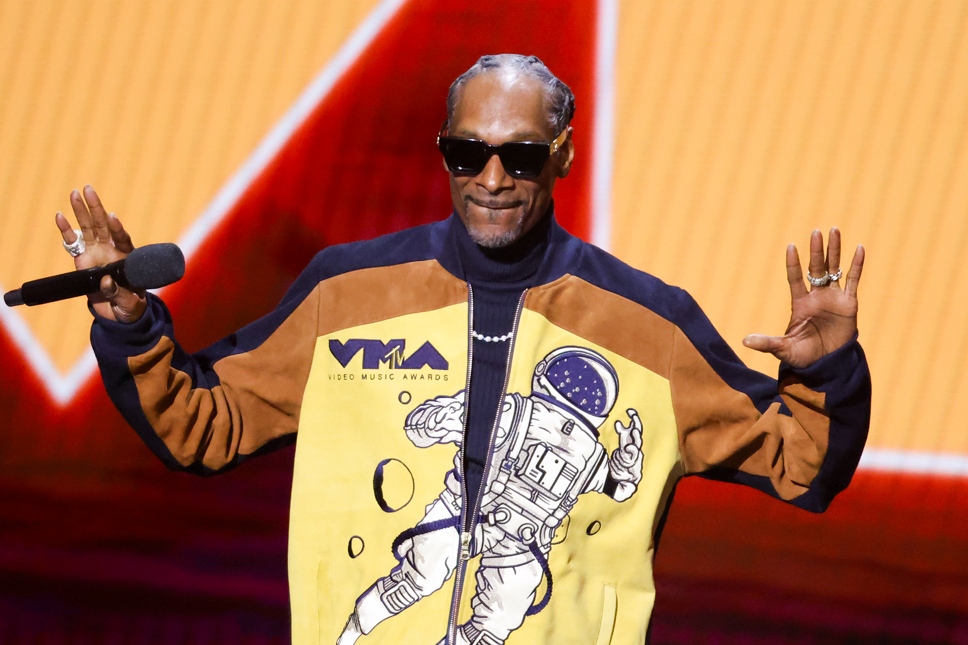 Snoop Dogg speaks onstage at 2026 MTV Video Music Awards held at Peacock Theater on September 27 in Los Angeles, California. | Source: Getty Images