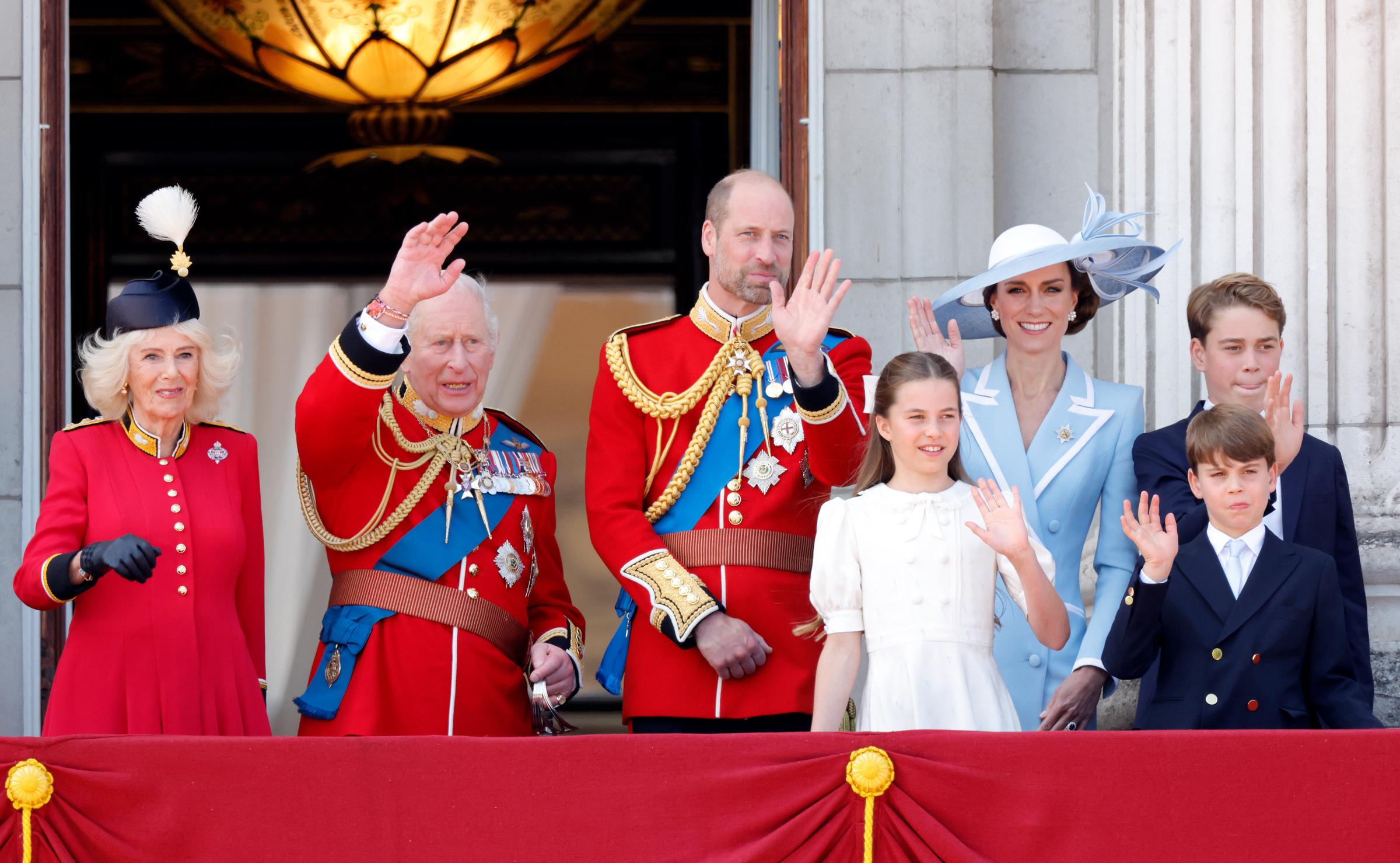 (L-R) Queen Camilla, King Charles III, Prince William, Prince of Wales, Princess Charlotte of Wales, Catherine, Princess of Wales, Prince George of Wales and Prince Louis of Wales watch an RAF flypast from the balcony of Buckingham Palace during Trooping The Colour on June 13, 2026 in London, England. | Source: Getty Images